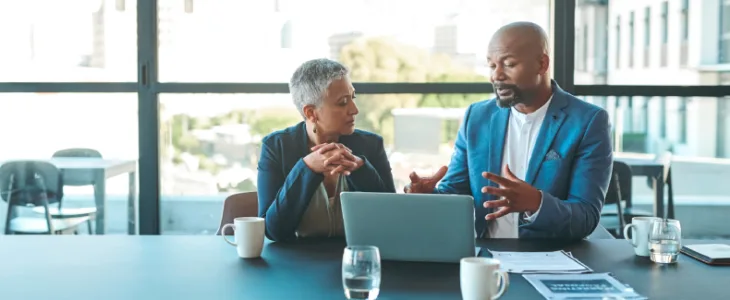 Two business people meeting