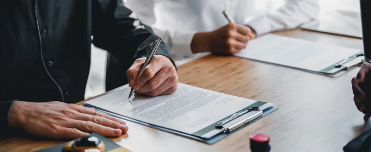 Business client writing a business succession plan