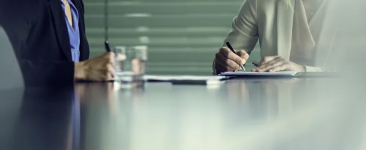 Business attorney meeting with business client