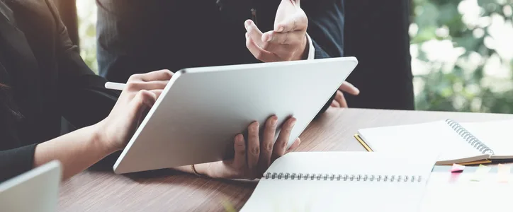 Business attorney sitting with client