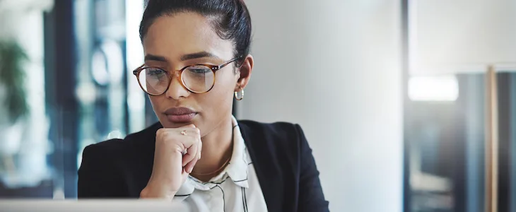 Business owner looking at computer