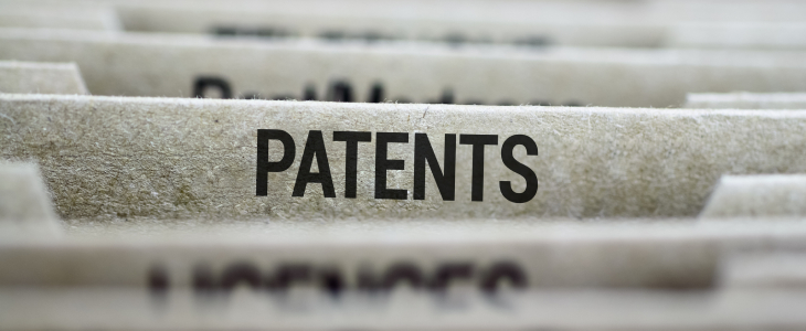 Papers in a file, one saying PATENTS