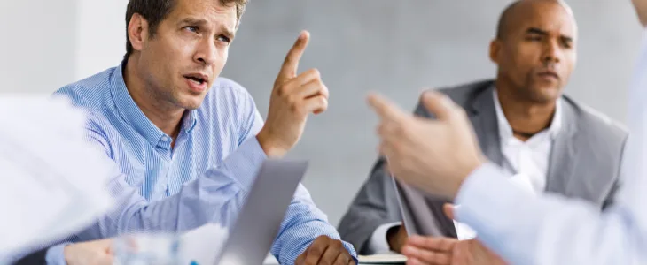 Frustrated entrepreneurs arguing during a business meeting in the office